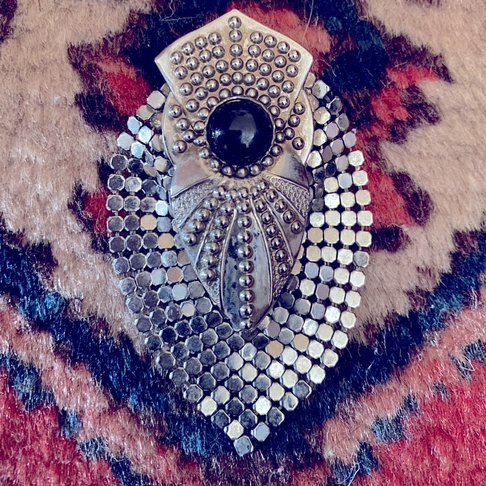 Vintage silver and onyx brooch